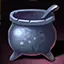 Iron cauldron with gargoyle faces